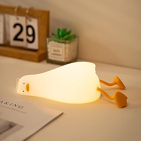 Korean night lamp lazy duck lying on a table