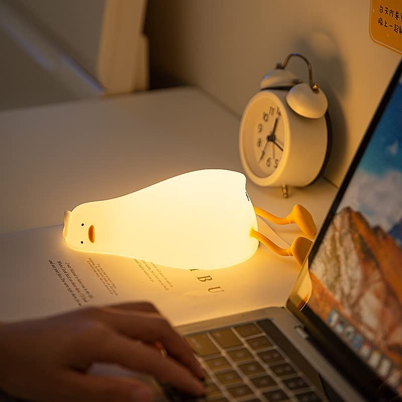 Korean night lamp lazy duck being used as a workspace decor