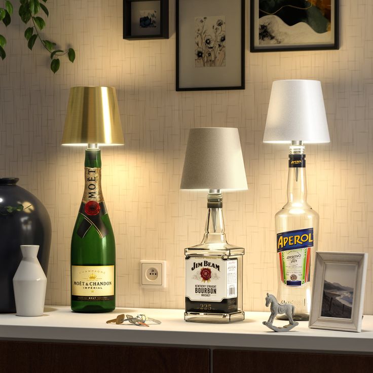 Portable wireless LED lamp fitted on a glass bottle, offering cozy lighting and elegant modern decor aesthetics.
