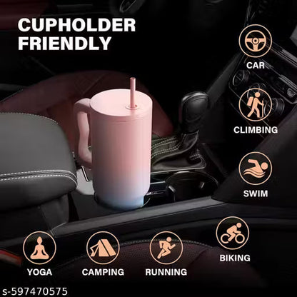 Elegant pink and blue gradient stainless steel tumbler with handle and straw, featuring a sleek insulated design — ideal for hot and cold beverages.