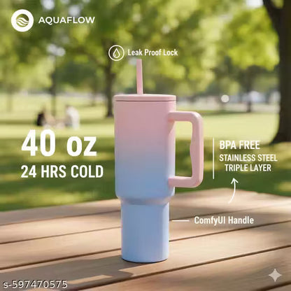Premium stainless steel gradient tumbler with handle, lid, and straw — pink and blue insulated travel mug for hot and cold beverages.